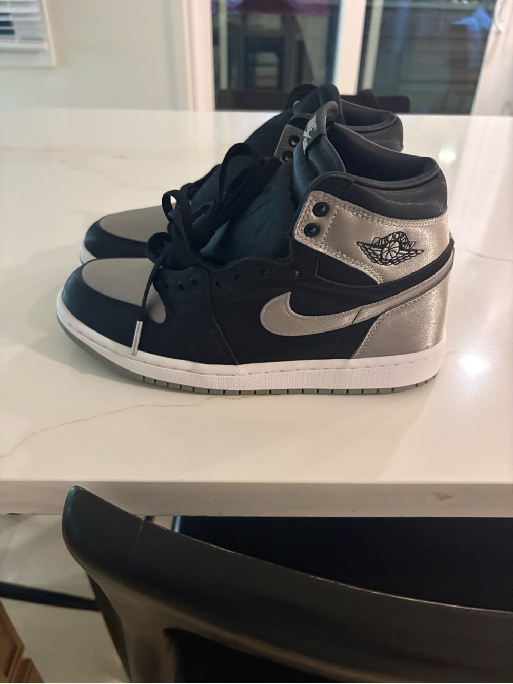 Jordan Women’s High-Top Sneakers in Black and Silver
